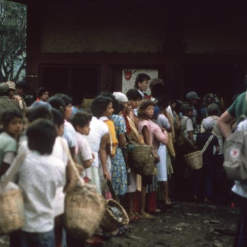 Tourists and community members gather for a tour through a coffee farm run by Nicaragua Libre, ca. 1985-1986. Box 3, Folder 1