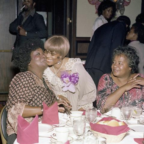 Norma Madkim interacting with guests at her retirement luncheon, 1978, Jack Davis Photograph Collection, Box 17 Folder 6.