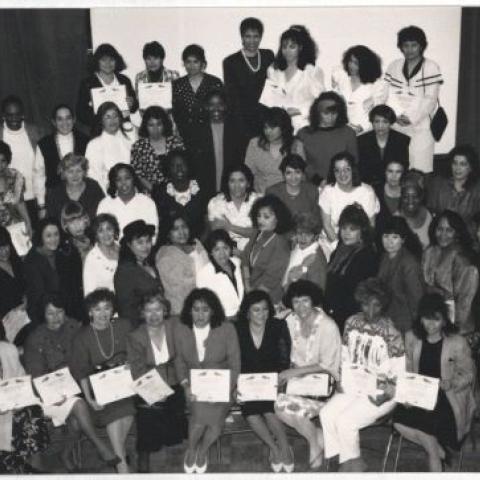 Graduates of a Micro-Business Workshop posing with CWED staff