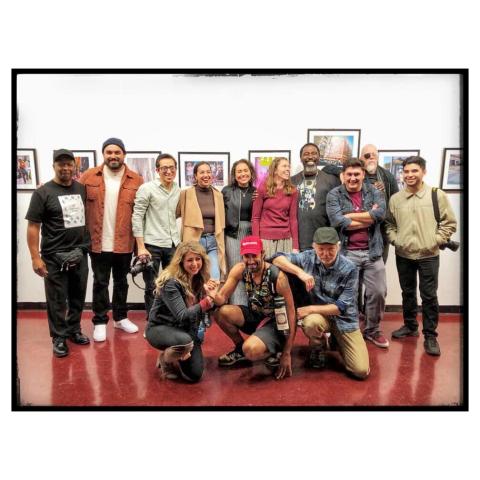 Group portrait of university and workshop students during the opening of the "How We See It" exhibit. David Blumenkrantz is located in the front row, far right. 2020.