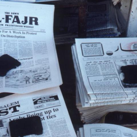 Photograph of Jerusalem-based papers, The Jerusalem Post next to al-Fajr, that was considered the unofficial organ of the Palestinian Liberation Organization (PLO). Box 4, Folder 11. 