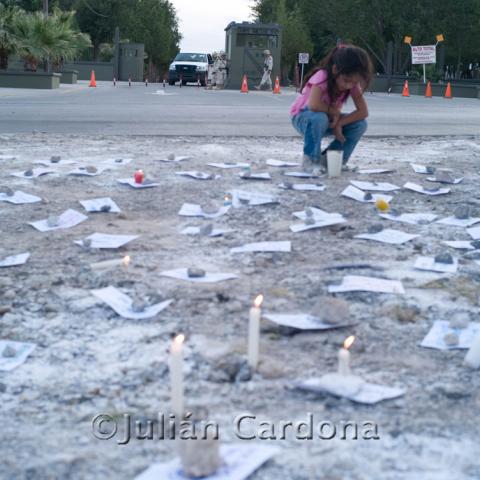 The names of the dead or disappeared are written on paper and placed on the ground, Juárez, 2008