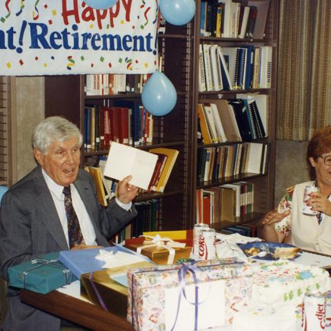 William Robertson receiving gifts at his retirement party, 1993, Los Angeles County Federation of Labor Collection, Box 489 Folder 26.
