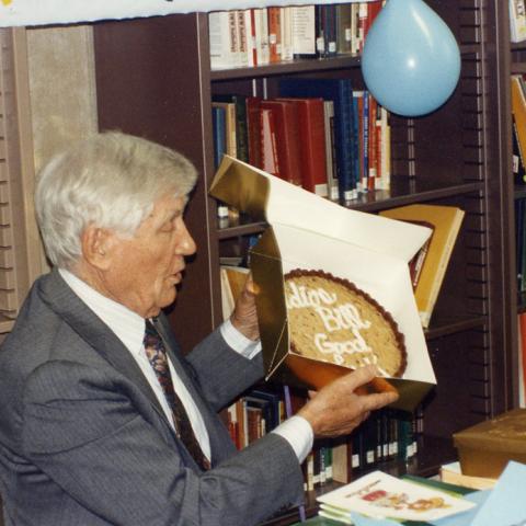 William Robertson receiving gifts at his retirement party, 1993, Los Angeles County Federation of Labor Collection, Box 489 Folder 26.