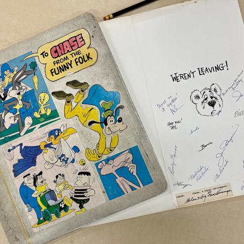 The cover of Chase Craig’s retirement scrapbook and signed card, 1975, Chase Craig Collection, Box 37.