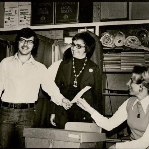 Candidate, Joy Picus looks on as her son Mark votes, 1973