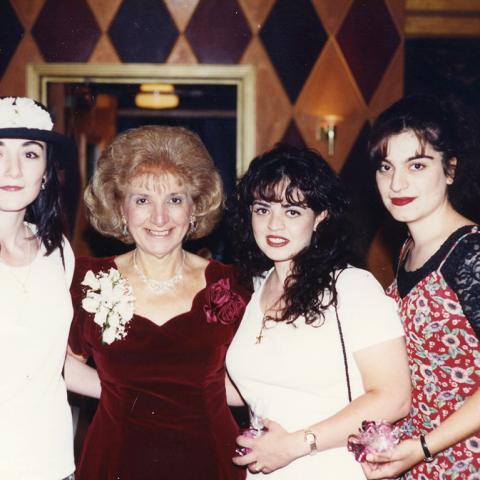 Sara Chitjian posing with guests at her retirement party, 1994, Zruhy ”Sara” Chitjian Collection, Box 108 Folder 7.