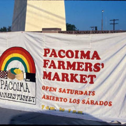 Pacoima Farmers' Market banner, Pacoima, ca. 1978-1981, ID: PRI29