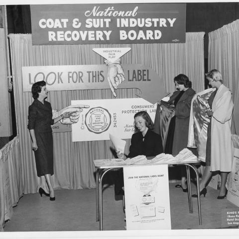 Models displaying union made coats at the 1955 Union Products and Services Show