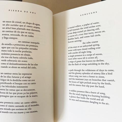 First page of the poem showing the original Spanish alongside the English translation on facing pages
