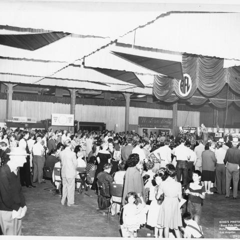 Musicians performing in the middle of the Pan Pacific Auditorium at the 1955 Union Products and Services Show