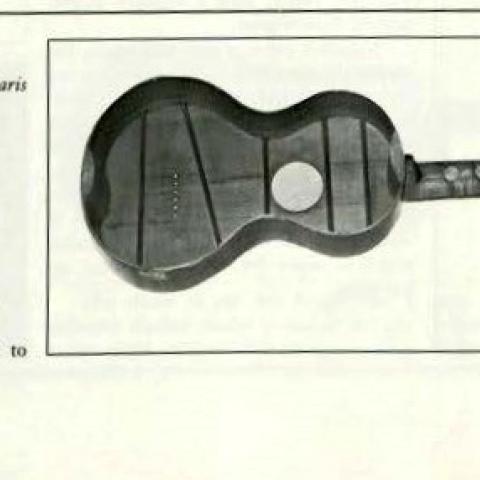 The inside of a guitar by Lacôte, showing the perpendicular bracing