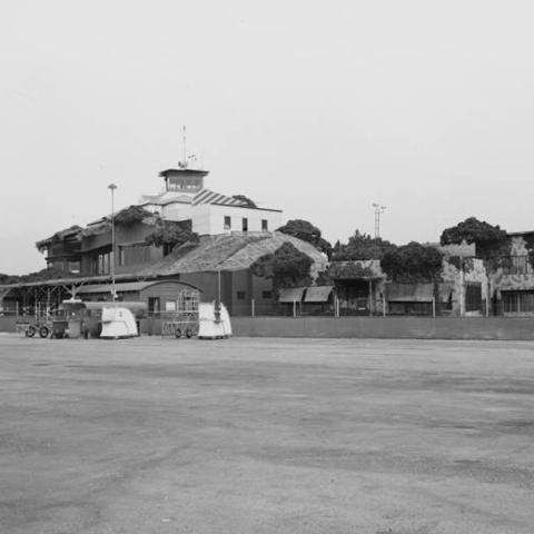 Lockheed Air Terminal during World War II with a camouflaged roof made to resemble a city when seen from above, ca. 1941-1945