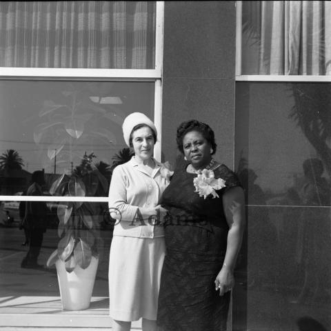 Civil rights activist Fannie Lou Hamer (right) stands beside an unidentified woman (left). 1965, Harry Adams, 93.01.HA.N120.B8.06.11.08