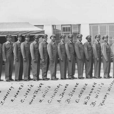 Bert Willis Skycaps at Lockheed Air Terminal, including H. Lowe, H. Tave, J. Hensley, A. Hooks, C. Jessie, Moose Taylor, M. Willis, C. Huntley, A. Joiner, B. Sloane, O. Marble, W. Bonner, B. Willis, and Rockey Wilson, ca. 1945-1955