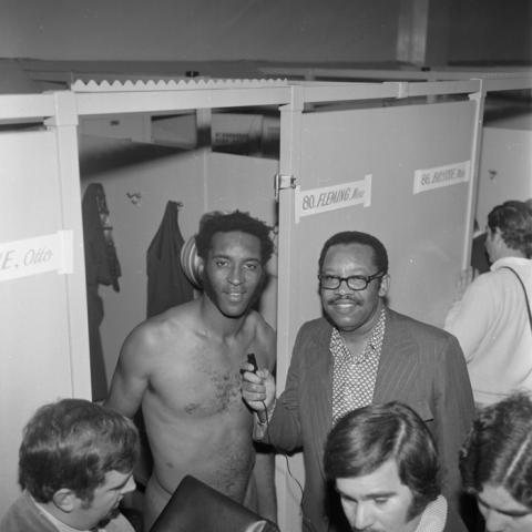Brad Pye, Jr. interviewing an athlete at the Los Angeles Memorial Coliseum