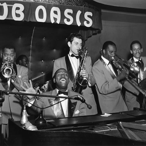 Earl "Fatha" Hines (piano) performing with Jonah Jones (trumpet) and Bennie Green at Club Oasis, Los Angeles, 1952.