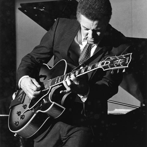 Kenny Burrell playing guitar at the Lazben Hotel, Los Angeles, 1990.