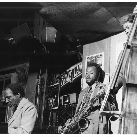 Thelonius Monk playing piano with Al Mc Kibbon and Paul Jeffries (sax) at Shelly's Manhole night club. 