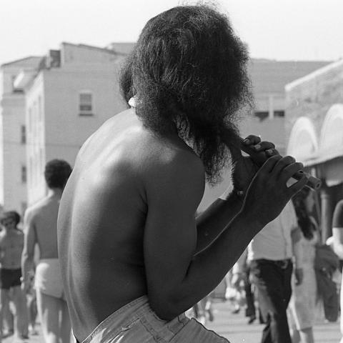 Venice, Flute player, 1981, Calvin Hicks Photograph Collection, Box 1 Folder 14