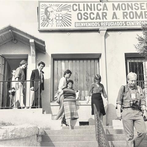 Image from collection selected by Student Assistant, Jenesy: A group of people leaving the Clinica Monseñor Oscar A. Romero in Los Angeles, undated.