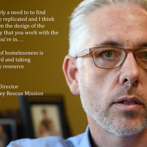 Portrait of Wade Trimmer with a quote from the One of Us Project, 2018. The quote reads, “…there’s definitely a need to find models that can be replicated and I think it’s everything from the design of the building to the way that you work with the community that you’re in… The only way out of homelessness is working really hard and taking advantage of every resource available to you. *Wade Trimmer, Director San Fernando Valley Rescue Mission”.