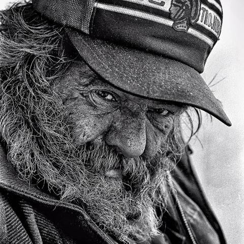 Portrait of Bob in Los Angeles wearing a USC Trojans cap, 1985.