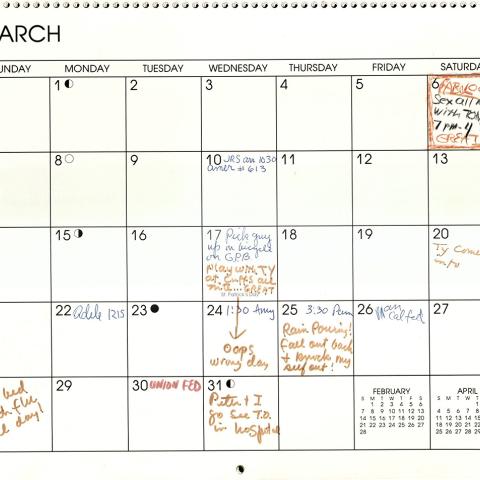 Monthly wall calendar opened to March 1993 calendar page