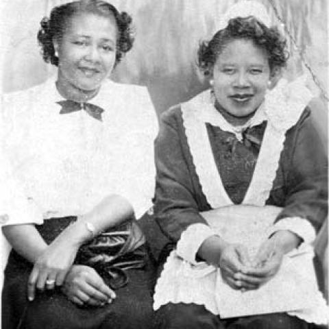 Ada Robinson (right) and Viola Wilson (left) dressed for work at a wedding party located at Crenshaw Boulevard and Rodeo Drive in Los Angeles