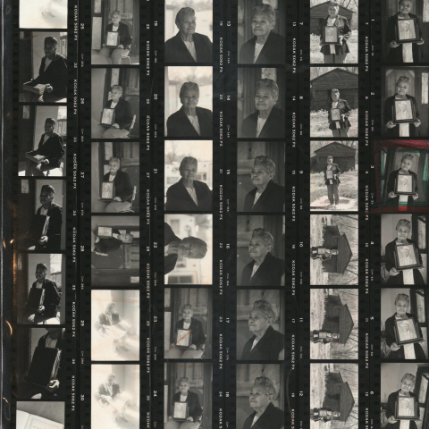 Portraits of Aunt Geneva Clark while she holds a framed photograph of Robert Celestin, her father. TBC.RCH