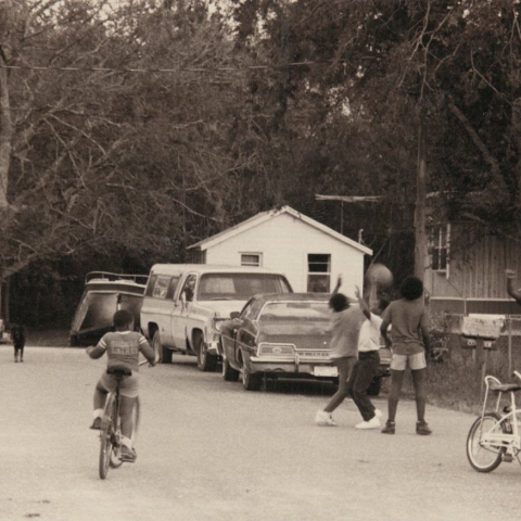 Young Bobtown locals play basketball in the Bobtown’s main circular street. TBC.RCH