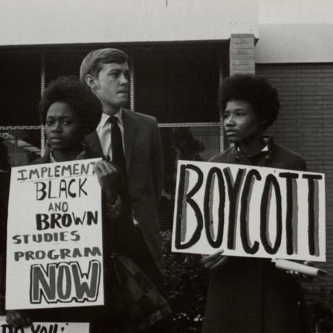 African-American students hold protest signs in front of the Administration Building, ID: UA05548