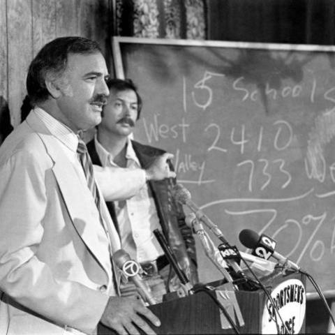 State Assemblyman Robert Cline speaking at a BUSTOP town meeting, 1977