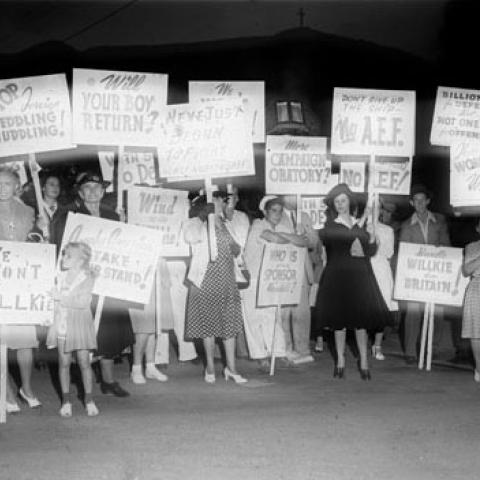 Picketers carry signs at an anti-Wendell Willkie rally in Los Angeles