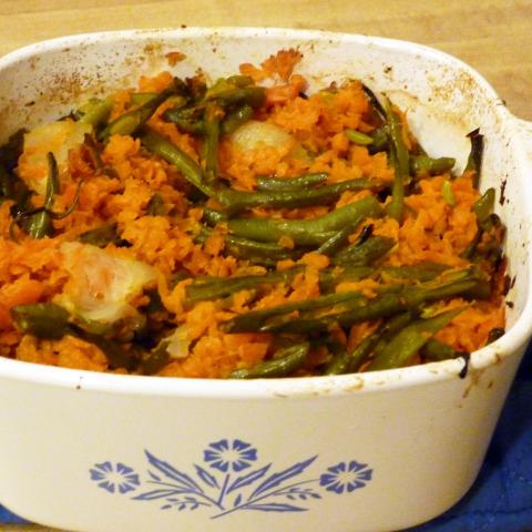 Honey Baked Carrots and Beans just out of the oven. Recipe from Cooking magic : fabulous foods step-by-step cookbooks, by Culinary Arts Institute, TX715 .C95 1954 v.1 no.102