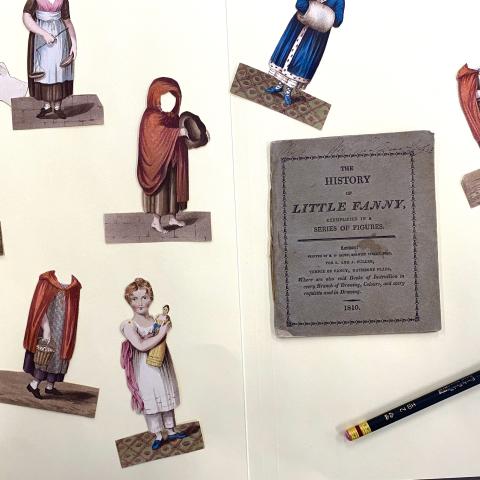 Front cover, paper doll head insert, and paper outfits from The History of Little Fanny, GT737 .H57 1810