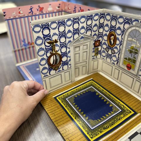 View of the rooms in The Fold-Away Doll House and Play Book of Cut-Out Furniture, TT174.5.P3 F6 1949