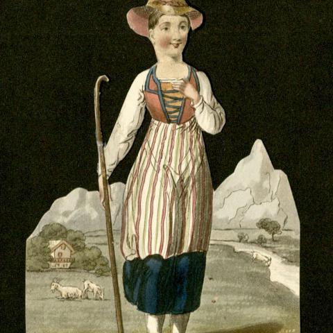 "Lauretta attending her goats"