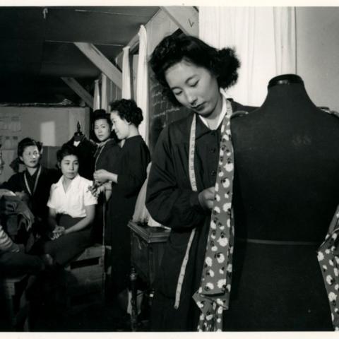 Women at a camp sewing shop
