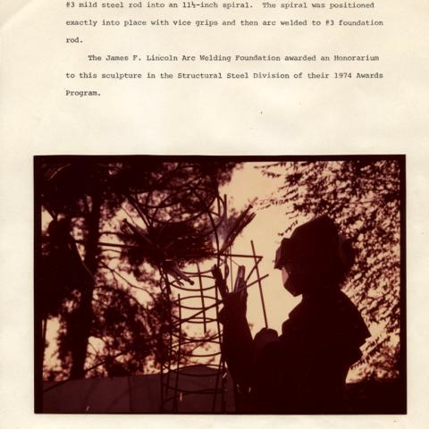 The steel structure of the sculpture being welded