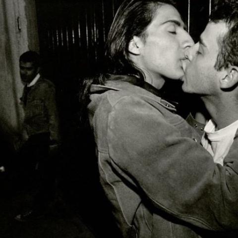 Same sex couple kiss
