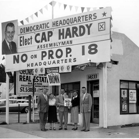 Campaign associates in front of the Van Nuys field office for the "No on Proposition 18" campaign, 1958