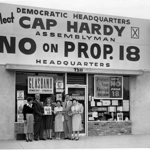 Campaign associates in front of the Canoga Park field office for the "No on Proposition 18" campaign, 1958