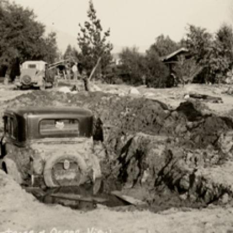 Montrose Flood, 1934, a partially buried automobile
