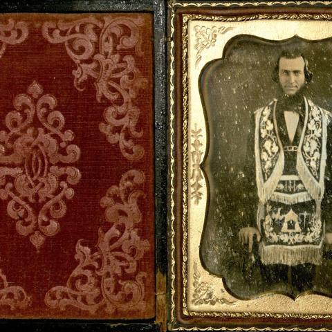 Man in fraternal regalia