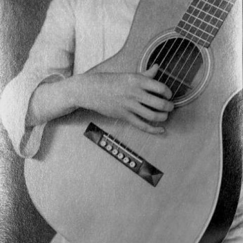 A classical guitar being played