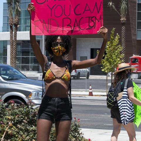 An unidentified individual holds a poster that reads "Only You Can End Racism" during a gathering for Breonna Taylor Marina Del Rey, 2020, KRT.D.B1.12.3761