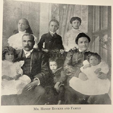 Photograph of two adults and six children of study participants the Rucker Family; A Study of Some Negro-White Families in the United States, Caroline Bond Day, E185.62 D3
