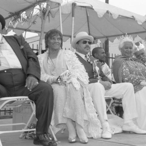 Elders seated on a platform with the Queen and King of the 1999 LALA Mardi Gars. Calvin Hicks Collection.  Elders seated on a platform with the Queen and King of the 1999 LALA Mardi Gars. Calvin Hicks Collection.