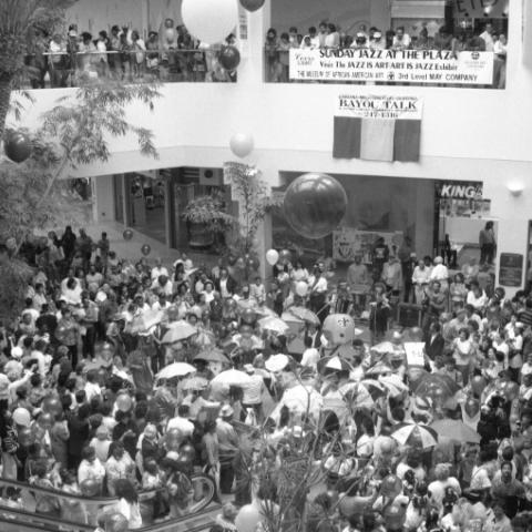 A wide distant shot of Mardi Gras festivities inside the Baldwin Hills Mall in 1990. Roland Charles Collection. A wide distant shot of Mardi Gras festivities inside the Baldwin Hills Mall in 1990. Roland Charles Collection.
